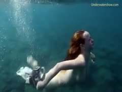 Clean and new dilettante redhead legal age teenager hottie underwater in the sea